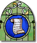 scroll of music on stained glass