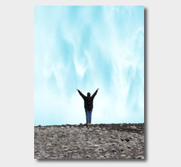 Person in front of waterfall